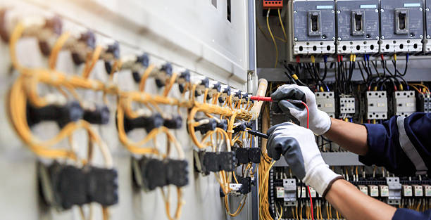 Professional Electrical Panel Upgrade technician working in Madison County County, IA